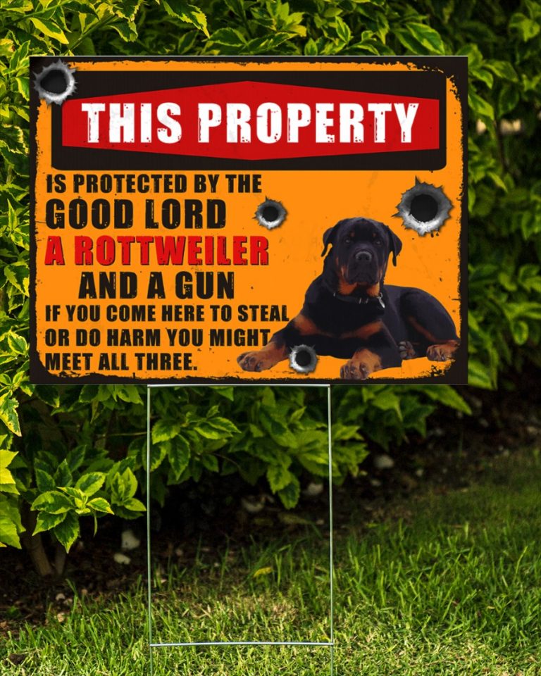 Rottweiler This property is protected by good lord a Rottweiler and a gun yard sign 15