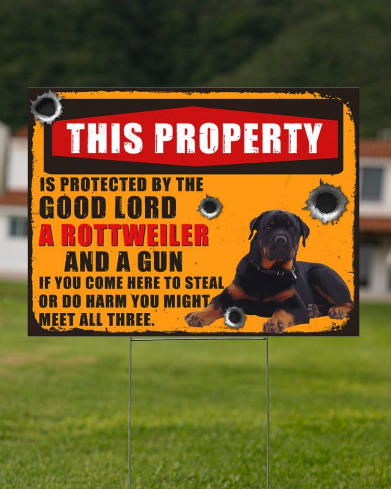 Rottweiler This property is protected by good lord a Rottweiler and a gun yard sign 17