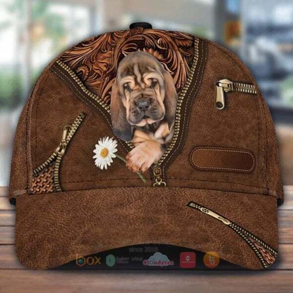 Bloodhound_Holding_Daisy_Cap_Hat