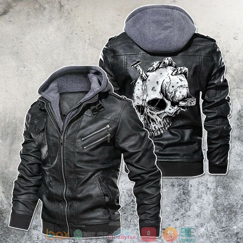 Hand_Holds_Skiked_Skull_Motorcycle_Rider_Art_Leather_Jacket